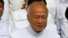 FILE - Prince Norodom Ranariddh and the royal FUNCIPEC Party walks together at the National Assembly, in Phnom Penh, Cambodia, Nov. 28, 2018.