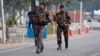 Indian security forces patrol inside the Indian air force base that came under attack Saturday in Pathankot, India, Jan. 3, 2016.