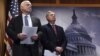 FILE - Sen. John McCain, R-Ariz., (left) and Sen. Lindsey Graham, R-S.C., wait to speak during a news conference on Capitol Hill in Washington, Jan. 21, 2016.