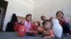 Displaced children play in a room in a school, where they are living with their family, who fled after a Saudi-led airstrike destroyed their houses, in Sana'a, Yemen, May 14, 2015.