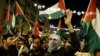 People take part in a protest against Donald Trump's decision to recognize Jerusalem as the capital of Israel, in Athens, Greece, Dec. 8, 2017.