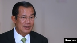 FILE: Cambodia's Prime Minister Hun Sen arrives at the National Assembly of Cambodia during a plenary session in Phnom Penh February 14, 2018. REUTERS/Samrang Pring