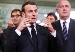French President Emmanuel Macron criticizes, Feb. 22, 2020, Cameroon's handling the conflict in its English-speaking regions.