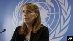 FILE PHOTO - UN Special Rapporteur on the Situation of Human Rights in Cambodia Rhona Smith listens to a reporter's questions during a press conference at her main office in Phnom Penh, Cambodia, Wednesday, Oct. 19, 2016. Smith on Wednesday wrapped up her ten-day mission to Cambodia during which she met with the government officials, people of non-governmental organizations and opposition party lawmakers. (AP Photo/Heng Sinith)