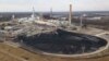 A large field of coal is stored on the property of Dominon Energy's Chesterfield Power station in Chester, Virginia., Dec. 4, 2017. The station is a coal fired power station along the James River. 