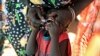FILE - Displaced South Sudanese child receives oral cholera vaccine in a camp for internally displaced people in Juba, Feb. 2014.