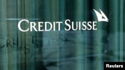 FILE PHOTO: A logo is pictured on the Credit Suisse bank in Geneva