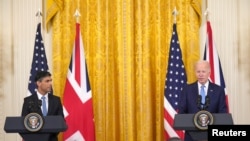 Rishi Sunak (L) Waziri Mkuu wa Uingereza na Rais wa Marekani Joe Biden wakiwa mjini Washington DC