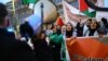 People take part in a rally in solidarity with Palestinians in Berlin, Germany, on Nov. 18, 2023. The German Foreign Ministry said it found no misuse of humanitarian aid to the Palestinian territories in a review prompted by the Oct. 7 Hamas attacks on Israel.