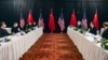 U.S. Secretary of State Antony Blinken, second right, and Chinese Foreign Minister Wang Yi, left, lead their delegations in U.S.-China talks in Anchorage, Alaska, March 18, 2021.