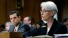 Undersecretary of State for Political Affairs Wendy Sherman (R) accompanied by Treasury Undersecretary For Terrorism And Financial Intelligence David Cohen, testifies on Capitol Hill in Washington, July 29, 2014.