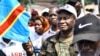 Cherubin Okende, waziri wa zamani wa uchukuzi na kujiunga na upinzani, akishiriki maandamano mjini Kinshasa, Machi 11, 2023. Picha ya AP