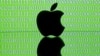 A 3-D printed Apple logo is seen in front of a displayed cyber code in this illustration taken Feb. 26, 2016. 