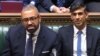 In an image taken from video, British Prime Minister Rishi Sunak, right, and British Home Secretary James Cleverly listen to a response after Cleverly spoke about the government's migrant deportation plan in the House of Commons, in London, on Dec. 6, 2023. (AFP photo/PRU)
