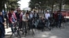 FILE - Journalists gather for a news event at Shahr-e-Naw Park in Kabul, Afghanistan, April 30, 2019.