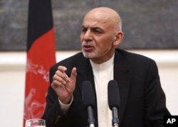 FILE - Afghan President Ashraf Ghani speaks at a news conference in Kabul, July 12, 2016.
