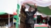 FILE - Burundi's President Evariste Ndayishimiye gestures to the crowd after his inauguration in Gitega, Burundi, June 18, 2020. 