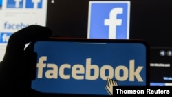 FILE PHOTO: Facebook logos