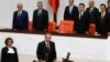 Turkey's new President Tayyip Erdogan (front C) attends a swearing in ceremony at the parliament in Ankara, August 28, 2014.