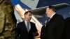 Secretary of State Mike Pompeo, center, talks with Charge D'affaires at the U.S. Embassy in Baghdad Joey Hood, in Baghdad, May 7, 2019. British Maj. Gen. Chris Ghika, a senior officer in the U.S.-led military coalition says there is no increased threat from Iran or Syria.