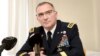 FILE - Commander of the U.S. European Command Curtis M. Scaparrotti speaks during his presentation for Finnish National Defense Course Association in Helsinki, Finland, Aug. 9, 2017. 
