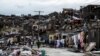 FILE - Clean up from Hurricane Matthew continues in Jeremie, Haiti, Oct. 6, 2016.
