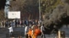 Zimbabweans protest in downtown Harare, Zimbabwe, Aug. 1, 2018.