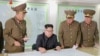 朝鲜官媒视频截图显示金正恩在平壤听取军队汇报。