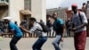 South Africa University Protests: Protesting students from the University of the Witswatersrand sing outside the Hillbrow Magistrate’s Court in Johannesburg, South Africa, Wednesday, Oct. 12, 2016, in support of their peers who were arrested earlier this week.