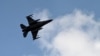 FILE - A Turkish fighter jet flies above the Incirlik airbase in southern Turkey.