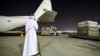 Humanitarian aid provided by the United Nations is loaded onto a United Arab Emirates Air Force C-130H-30 Hercules turboprop military transport aircraft at Dubai International Airport before departure for Cairo on Oct. 19, 2023.