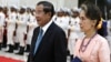 FILE PHOTO - Myanmar's State Counsellor Aung San Suu Kyi is welcomed by Cambodia's Prime Minister Hun Sen at the Peace Palace in Phnom Penh, Cambodia, on April 30, 2019. (REUTERS/Samrang Pring)