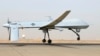 FILE - An MQ-1B Predator from the 46th Expeditionary Reconnaissance Squadron takes off from Balad Air Base in Iraq.