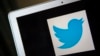 FILE - A portrait of the Twitter logo in Ventura, California.
