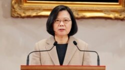 VOA Asia - Taiwan and China trade conflicting messages