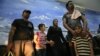 Officials said they rescued 60 asylum seekers after their boat broke down while trying to reach Australia, July 29, 2012.