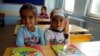 FILE - Syrian refugee children study at Fatih Sultan Mehmet School in Ankara, Turkey, Sept. 28, 2015. A new UNICEF appeal aims to assist youngsters, including in getting education. 