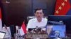 Menko Maritim dan Investasi Luhut Binsar Pandjaitan usai Ratas dengan Presiden Jokowi di Jakarta, Senin (12/7) optimis kasus corona akan segera melandai. (Foto: VOA)