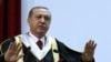 FILE - Turkey's President Recep Tayyip Erdogan addresses an audience after receiving an honorary doctorate from Qatar University, in Doha, Qatar, Dec. 2, 2015.