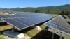 A portion of the Stafford Hill solar power project gathers energy from the sun in Rutland, Vt., on Tuesday, Sept. 15, 2015. 