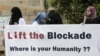 Healthcare workers demonstrate against a blockade on Yemen imposed by a Saudi-led coalition that has caused food and fuel shortages, outside the headquarters of the United Nations in Sana'a, May 7, 2015