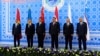 FILE - Leaders of the Shanghai Cooperation Organization pose for a photo during the group's summit in Dushanbe, Tajikistan, Sept. 12, 2014.