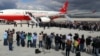 Freed Turkish hostages are welcomed at the airport in Ankara, Sept. 20, 2014.