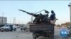 Les milices gouvernementales combattent l'armée nationale libyenne à Tripoli
