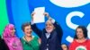 Brazilian President Luiz Inácio Lula da Silva holds a document with the final statement during the closing meeting of the G20 Social Summit in Rio de Janeiro, Brazil, on November 16, 2024. (Photo by Daniel RAMALHO / AFP)