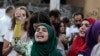 Protesters attend an anti-government rally in downtown Beirut, Lebanon, Sept. 2, 2015.