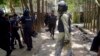 Bangladeshi policemen arrive near the scene of a blast in Kishoreganj, about 90 kilometers (60 miles) north of the capital of Dhaka, Bangladesh, July 7, 2016.