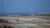 Aviones estacionados en el aeropuerto de Maiquetía luego de que el gobierno de Nicolás Maduro cancelara vuelos domésticos y algunos destinos internacionales en medio de la nueva pandemia de coronavirus, en La Guaira, Venezuela, el 21 de marzo de 2020.