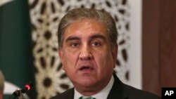 FILE - Pakistani Foreign Minister Shah Mahmood Qureshi speaks during a press conference in Islamabad, Aug. 17, 2019.