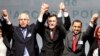 L-R, Mohammed Chouaib, head of delegation from the U.N.-recognized government in the eastern city of Tobruk, Libya, Fayez Sarraj, Libyan prime minister, and Dr. Saleh Almkhozom, second deputy chairman of the Libyan General National Congress, react after signing a U.N.-sponsored deal aiming to end Libya's conflict, Dec.17, 2015 in Sikhrat, Morocco. 
